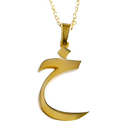 Gold crescent moon pendant on a white background